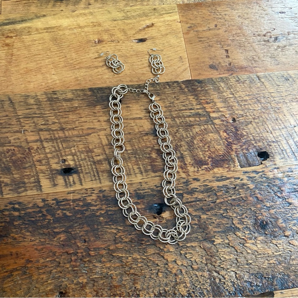 Gold tone link necklace with matching earrings